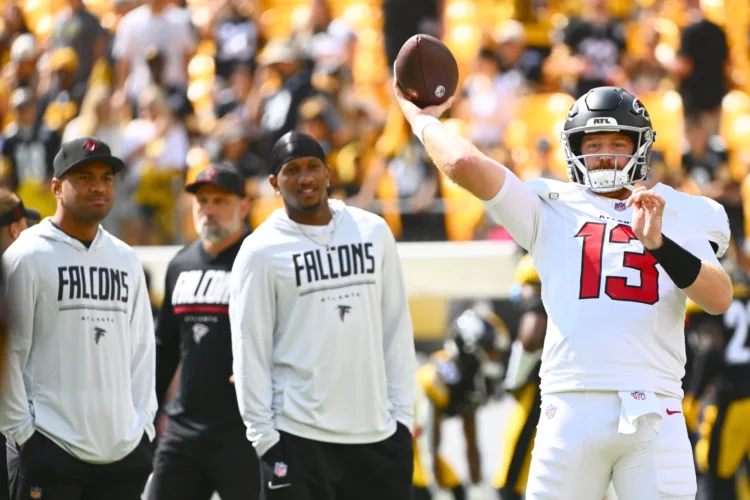 Sports at a glance: Falcons tap Rush to start